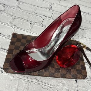 Red patent BCBG generation heels with peep toe
